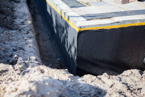 Professional Waterproofing technician working in Hortonville, WI